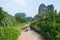 Limestone Landscape with Road and Motorbike, Tam Coc, Vietnam