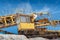 Limestone mining equipment, yellow vehicle. Industrial Gravel Quarry