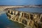 Limestone quarry with a pond