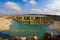 Limestone quarry with a pond