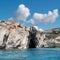 Limestone rock caves and blue Mediterranean water of Comino island