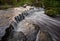 Limestone rock steps create a waterfall