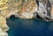 Limestone rocks with caves in Malta, Mediterranean seacoast