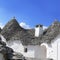 Limestone Roof of a Trullo with chimney in Alberobello Italy