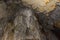 Limestone wall in a cave covered with dripstone ,Cheow Lan lake,Thailand