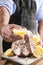 Limoncello with a glass on the table and a soft star-shaped pasta sprinkled with icing sugar.