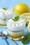 Limoncello - italian Dessert.  Lemon Cheesecake Mousse with Whipped Cream in cups.