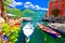 Limone sul Garda turquoise waterfront and boats view