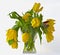 Limp bouquet of yellow tulips