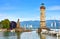 Lindau, Germany. Old lighthouse with clock in the bay
