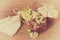 Linden tea and jar with honey decorated with linden flowers on wooden background