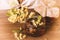 Linden tea and jar with honey decorated with linden flowers on wooden background