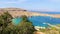 Lindos Beach bay panorama with turquoise clear water Rhodes Greece