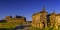 Lindoso Castle and historic stone granaries in the village of Lindoso in Portugal in warm evening light