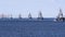 A line ahead of modern russian military naval battleships warships in the row, northern fleet and baltic sea fleet, summer sunny