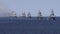 A line ahead of modern russian military naval battleships warships in the row, northern fleet and baltic sea fleet, summer sunny