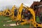 Line of four mechanical diggers, Somerset, England.