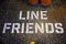 `Line Friends` Words on Ground in front of Line Cafe.