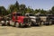 Line of logging trucks parked