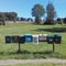 A line of mailboxes in countryside Sweden.