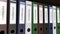 Line of multicolor office binders with Confidential tags 3D rendering