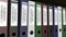 Line of multicolor office binders with Corporate reports tags 3D rendering