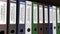 Line of multicolor office binders with Insurance certificates tags 3D rendering