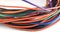 Line multicolored wires on a white closeup