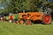 Line of old refurbished old tractors