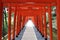 Line of orange torii gates at inari jinja of at Suwa Shrine in Nagasaki