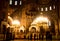 Line of people inside the ansient Cathedral