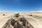 A line of piles of salt at Salar de Uyuni, Bolivia