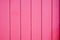 Line pink vertical ancient wood background in old wooden plank wall