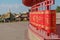 Line of red praying drums at datsan