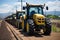 Line of stationary yellow tractors in a field, construction picture