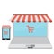 On line store. Sale, Laptop and smart phone with awning