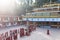 Line of Tibetan monks in front of Rumtek Monastery for welcoming high level monk near Gangtok. Sikkim, India.