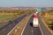 Line of trucks on the highway