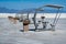 Line up of retro style picnic rest area tables and structures inside of White Sands National Park in New Mexico