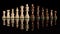 Line of wooden chess pieces isolated at dark background