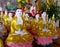 Line of yellow-dressed buddha statues