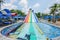 Lineal colorful striped water slider in the water park