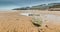 The linear patterns on the sand caused by the outgoing tide in Whitley Bay, England