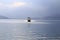 Liner, passenger liner, speedboat goes over Lake Como