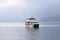 Liner, passenger liner, speedboat goes over Lake Como