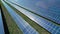 Lines of Solar panels on green eco electric solar energy farm