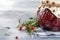 Lingonberry jam in a glass jar with cranberries, cowberries on light background