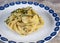 Linguine alla Nerano with fried zucchini and provolone cheese from Monaco