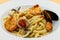 Linguine allo scoglio linguine with seafood. Spaghetti allo scoglio spaghetti with seafood.