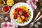 Linguine meatballs in bolognese sauce on wooden table